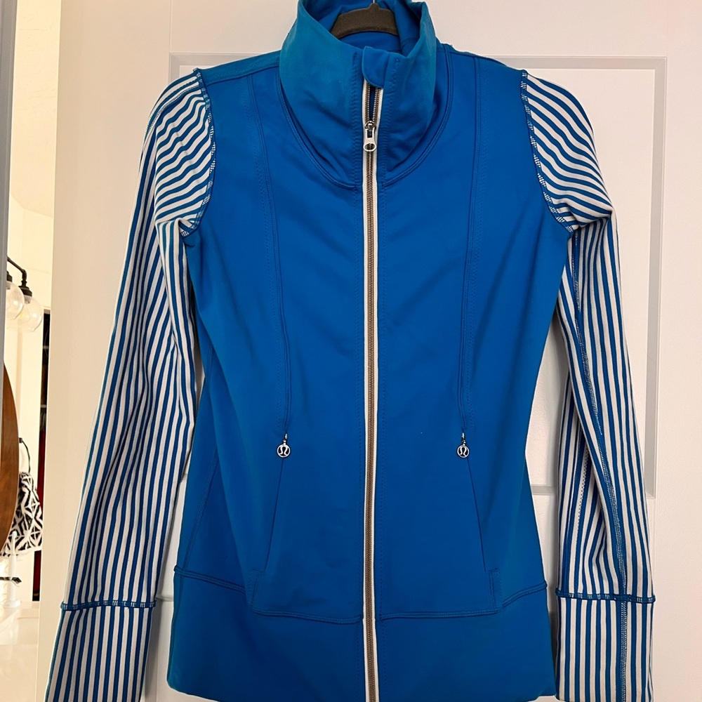 Nicest Lulu jacket! Great for layering over workout clothes! Barley used!